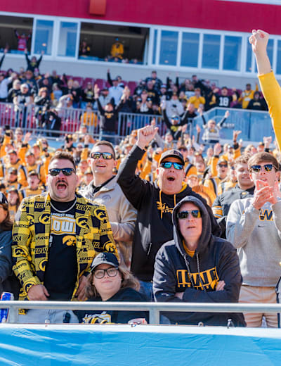 Iowa fans cheering in the stands